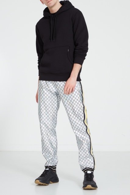 Блестящие брюки Gucci