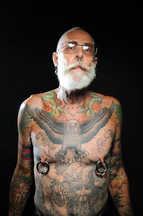 «Арестант 60 лет с татуировками бритый…» — создано в Шедевруме